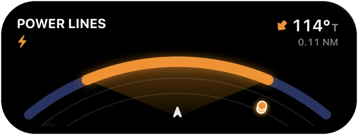 The same widget alerting: POWER LINES, bearing 114 degrees true, 0.11 nautical miles.
